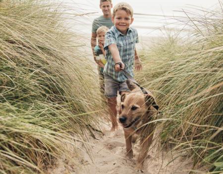 A family walking a dog