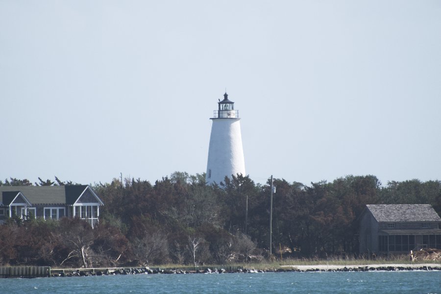 Ocracoke Lighthouse from Silver Lake. The lighthouse and grounds are slated for renovation. Ocracoke Lighthouse from Silver Lake. The lighthouse and grounds are slated for renovation.